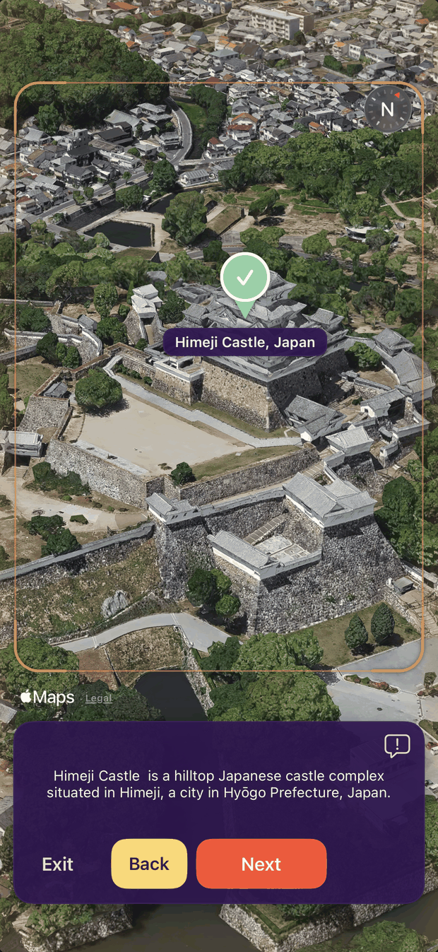 Explore in 3D: a tilted aerial view of Himeji Castle after the answer is revealed, with a short description of the site